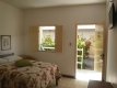 Quarto casal completo térreo com ; varanda com rede privativa,TV led,ar,frigobar. :: Pousada Planeta Guarajuba - Foto 6 Quarto casal completo térreo com ; varanda com rede privativa,TV led,ar,frigobar. :: Pousada Planeta Guarajuba - Foto 6